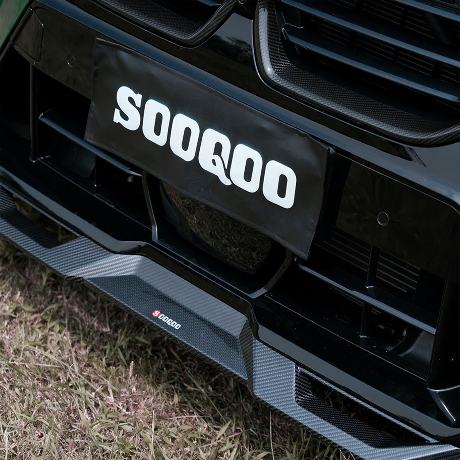 SooQoo BMW F95 X5M LCI Front Splitter In Gloss Carbon Fibre