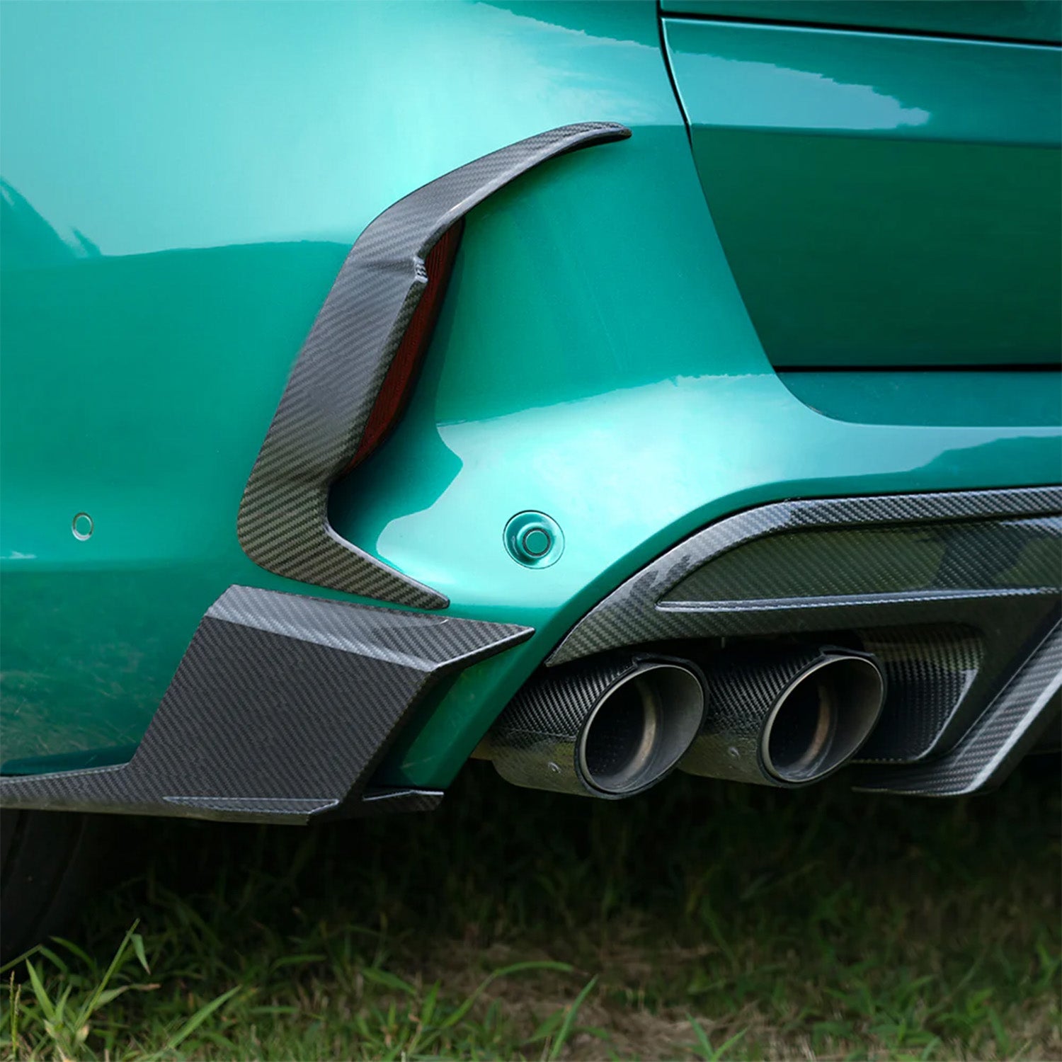 SooQoo BMW F95 X5M LCI Rear Bumper Trims In Gloss Carbon Fibre