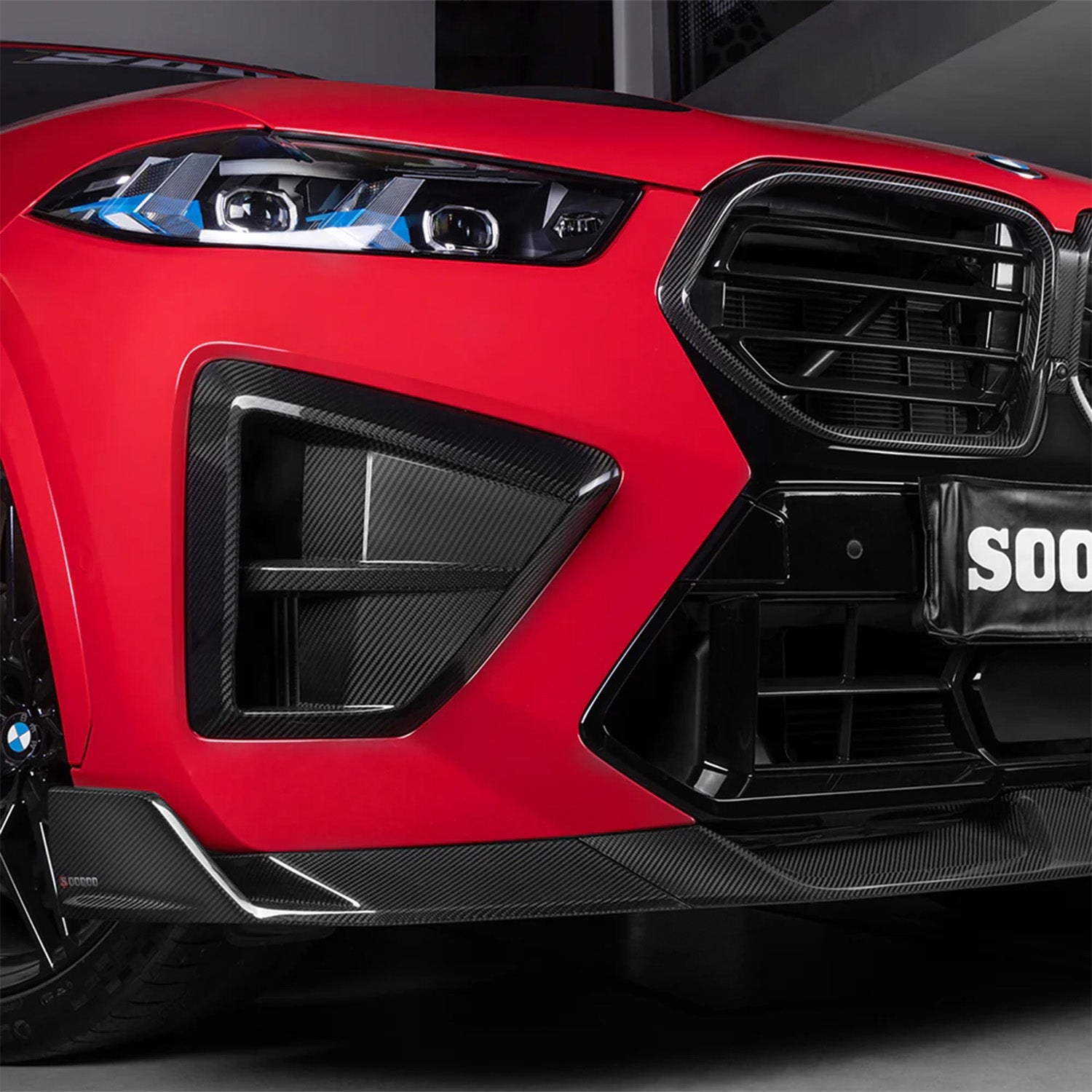 SooQoo BMW F96 X6M LCI Front Splitter In Gloss Carbon Fibre