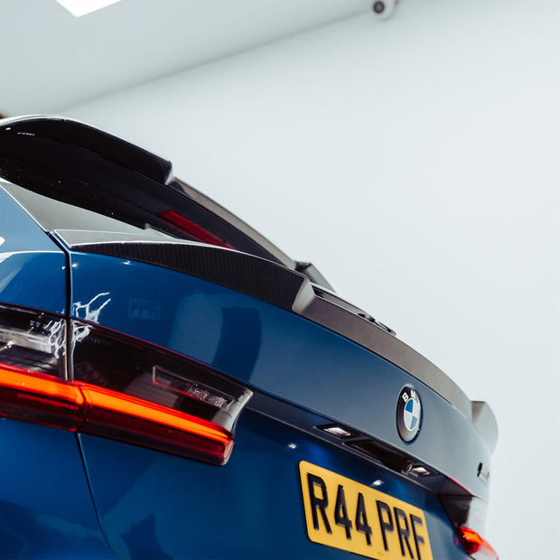SooQoo BMW G81 M3 Touring Lower Trunk Spoiler In Gloss Pre Preg Carbon Fibre (2023+)