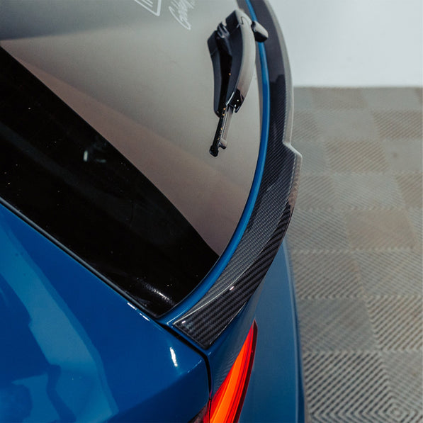 SooQoo BMW G81 M3 Touring Lower Trunk Spoiler In Gloss Pre Preg Carbon Fibre (2023+)
